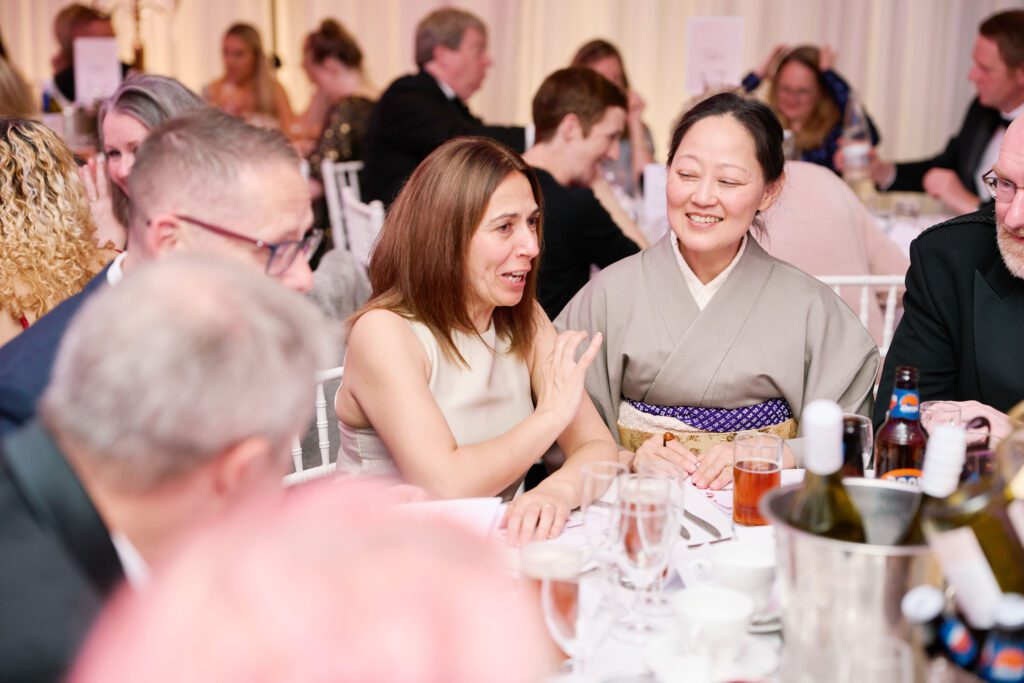 Colleagues from West Special Fasteners sat round a table enjoying the evening