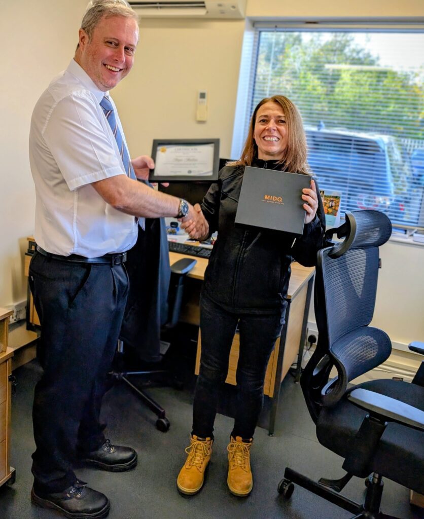 2 colleagues Handing out long service awards