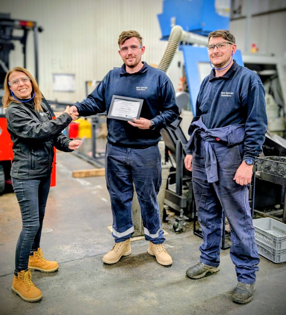 3 colleagues Handing out long service awards
